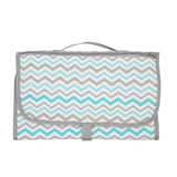 Foldable shopping bag with chevron pattern.