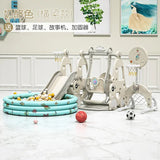 Children's play area with slides, swings, and balls on a marble floor.