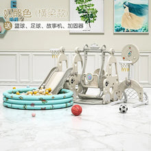 Children's play area with slides, swings, and balls on a marble floor.