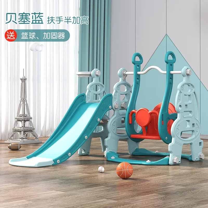 Children's playground equipment with slide and climbing structure on a wooden floor.