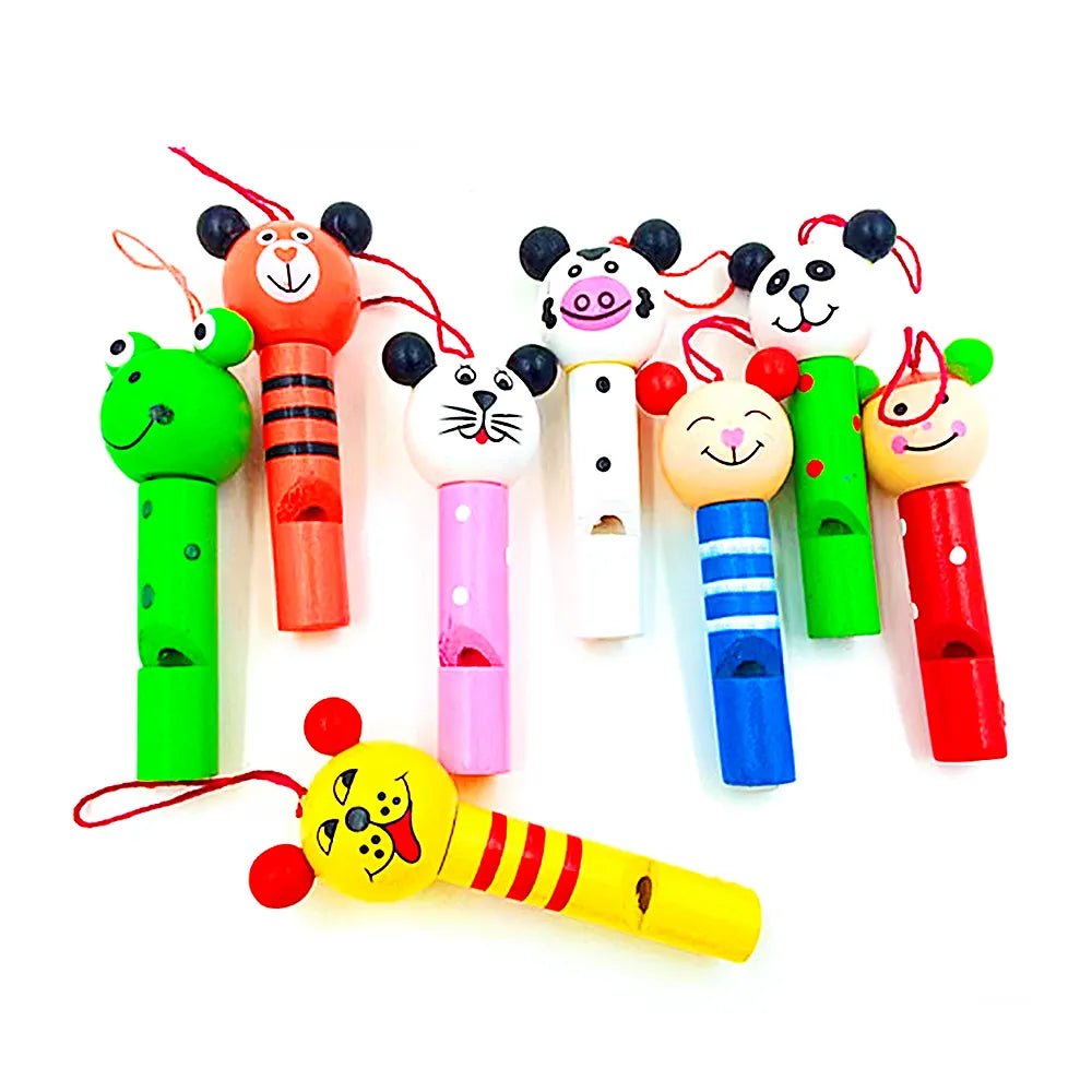 Mini wooden animal whistle set styled as a party gift for kids birthday celebrations and favors.