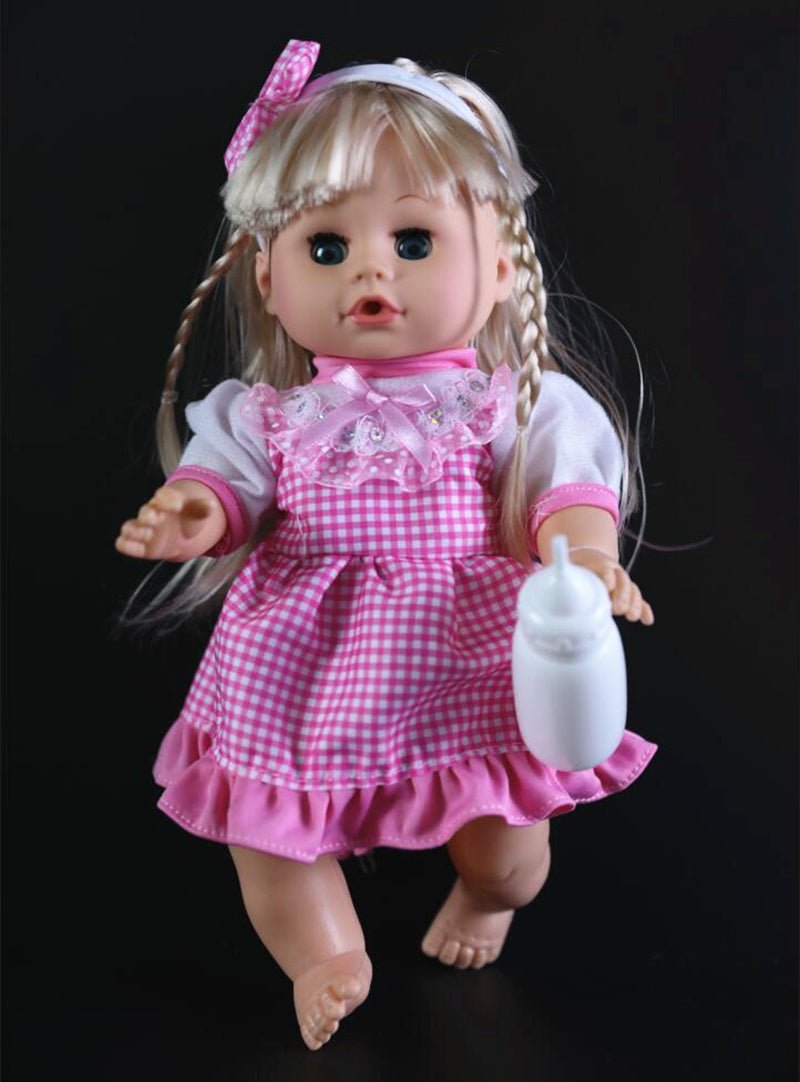 Close view of the electronic 32cm baby doll with blinking eyes and talking voice holding a bottle.