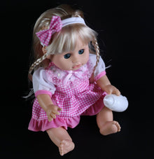 Talking and blinking 32cm baby doll in a pink checkered dress and white shoes for imaginative nurturing play.