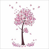 Decorative tree with pink flowers and butterflies on a white background