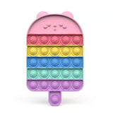 Colorful pop-it toy shaped like a popsicle on a white background