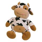 Plush cow toy with brown and black pattern on a white background