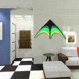 Green and black kite on a wall in a modern living room with checkered floor and furniture.