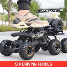 38cm 6WD RC car with 2.4GHz remote control for kids outdoor racing and hobby play.