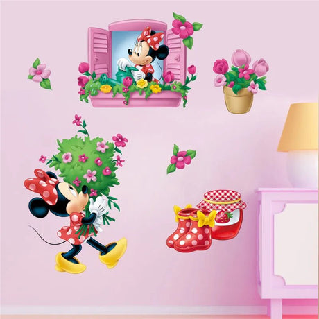 Wall stickers featuring cartoon characters on a pink wall.