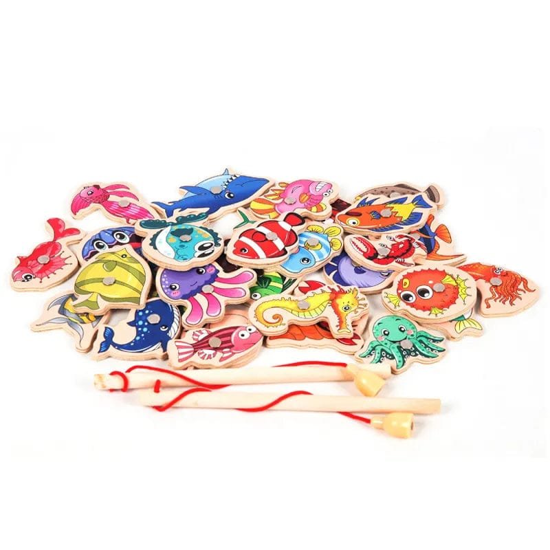 Colorful wooden fish toys on a white background