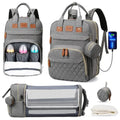 3-in-1 Backpack with Foldable Baby Bed and USB in gray with multiple compartments for organized nappy bag packing.