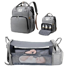 Gray multi-functional 3-in-1 backpack with foldable baby bed and USB port for busy parents on the move.
