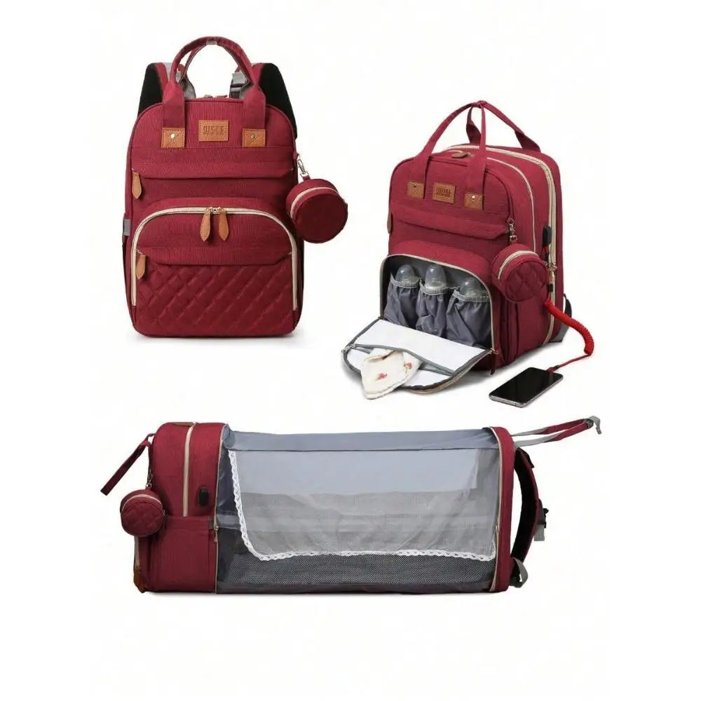 Red 3-in-1 diaper backpack with multiple compartments for storing bottles, nappies, and baby essentials.