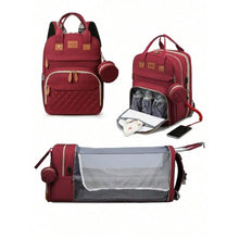 Red 3-in-1 diaper backpack with multiple compartments for storing bottles, nappies, and baby essentials.
