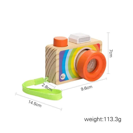 Wooden toy camera with colorful design and measurements on a white background