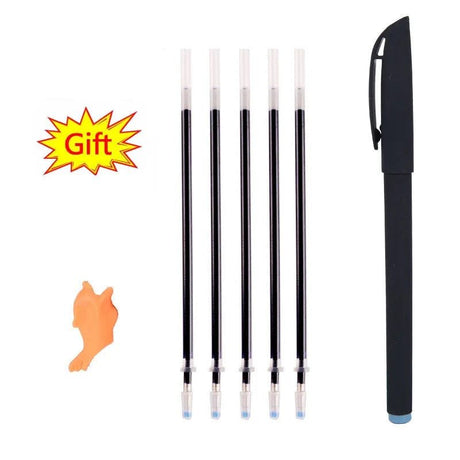 Black pen with four replacement cartridges and a small orange object on a white background