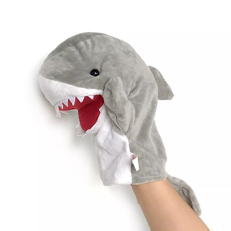 Shark-themed glove puppet on a white background