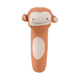 Plush monkey toy with a white face on a white background