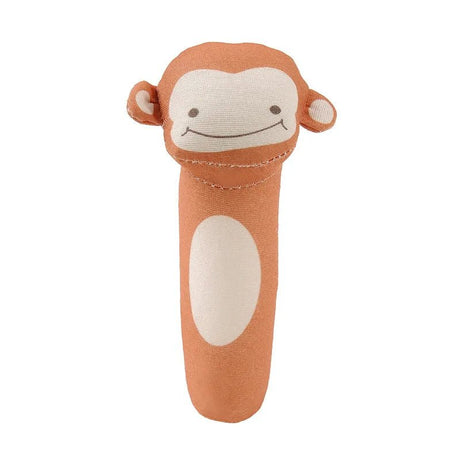 Plush monkey toy with a white face on a white background
