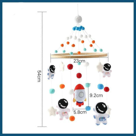 Children's mobile with space-themed decorations and measurements on a white background