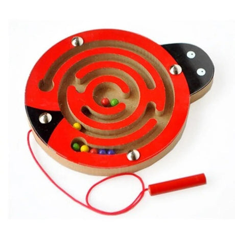 Wooden labyrinth toy with red rim and colorful balls on a white background