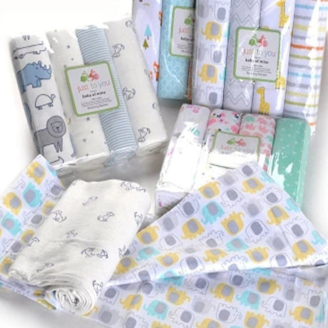 Collection of baby blankets with various patterns and colors.