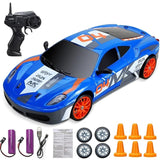 Blue toy race car with remote control, batteries, and accessories 
