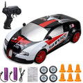 Toy race car with remote control, batteries, and accessories.