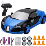 Blue and black toy car with remote control, batteries, and cones