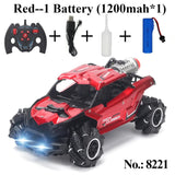 Red RC car with remote control, battery, and cable.