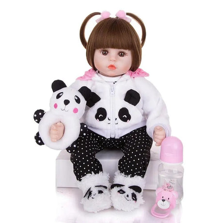  Doll in panda outfit with plush toy and bottle on white background