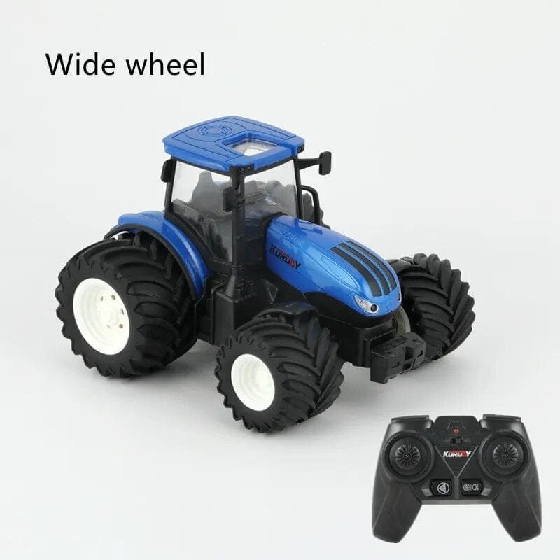 Blue toy tractor with wide wheels and a remote control on a white background