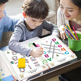 Child learning with educational materials at a table, assisted by two adults.