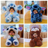 Four plush toys in different animal costumes on a wooden surface.