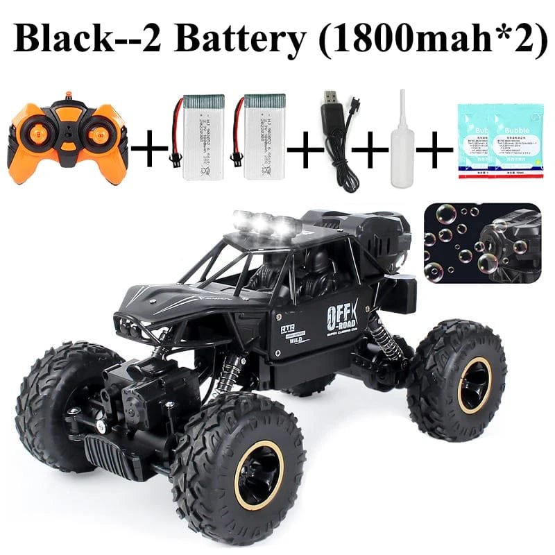 Flat lay of the 4WD RC bubble rock crawler toy and accessories for outdoor adventures and driveway racing.