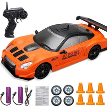 4WD RC Drift Car orange GTR/AE86 model racing toy with wheels and cones for young racers starting out in RC drift.