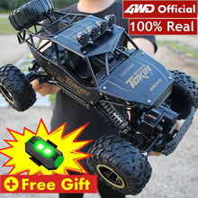 4WD RC Off-Road Buggy with LED lights, a remote control racing car for outdoor play on grass, gravel, and garden tracks.