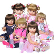 Group of dolls with various hairstyles and outfits 