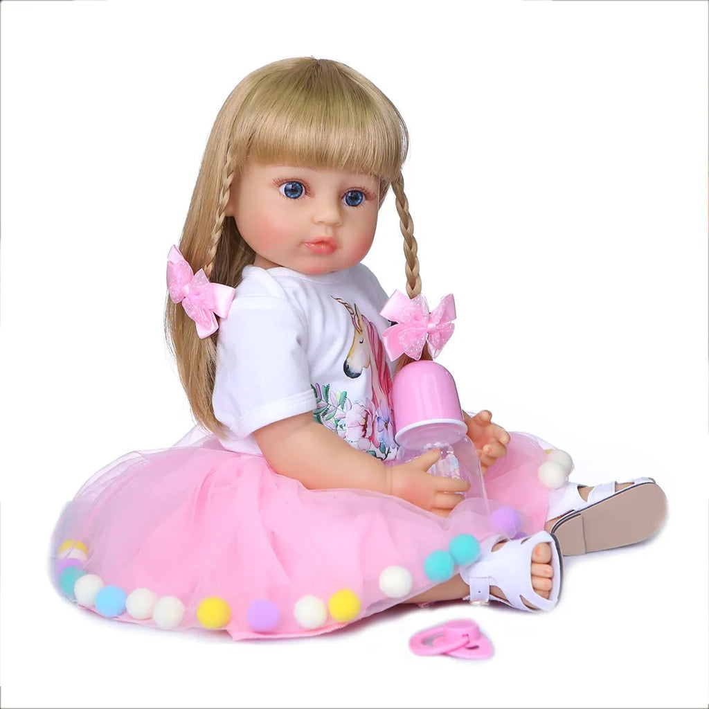 50CM Reborn Toddler Doll with blonde hair in a pink outfit, a snuggle-friendly silicone doll for cuddling and comfort play.