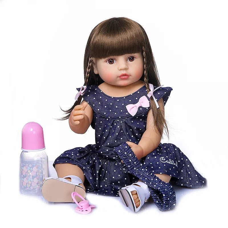 50CM Soft Silicone Reborn Doll in a polka dot dress with cute realistic face for doll collecting, display, and gifting.