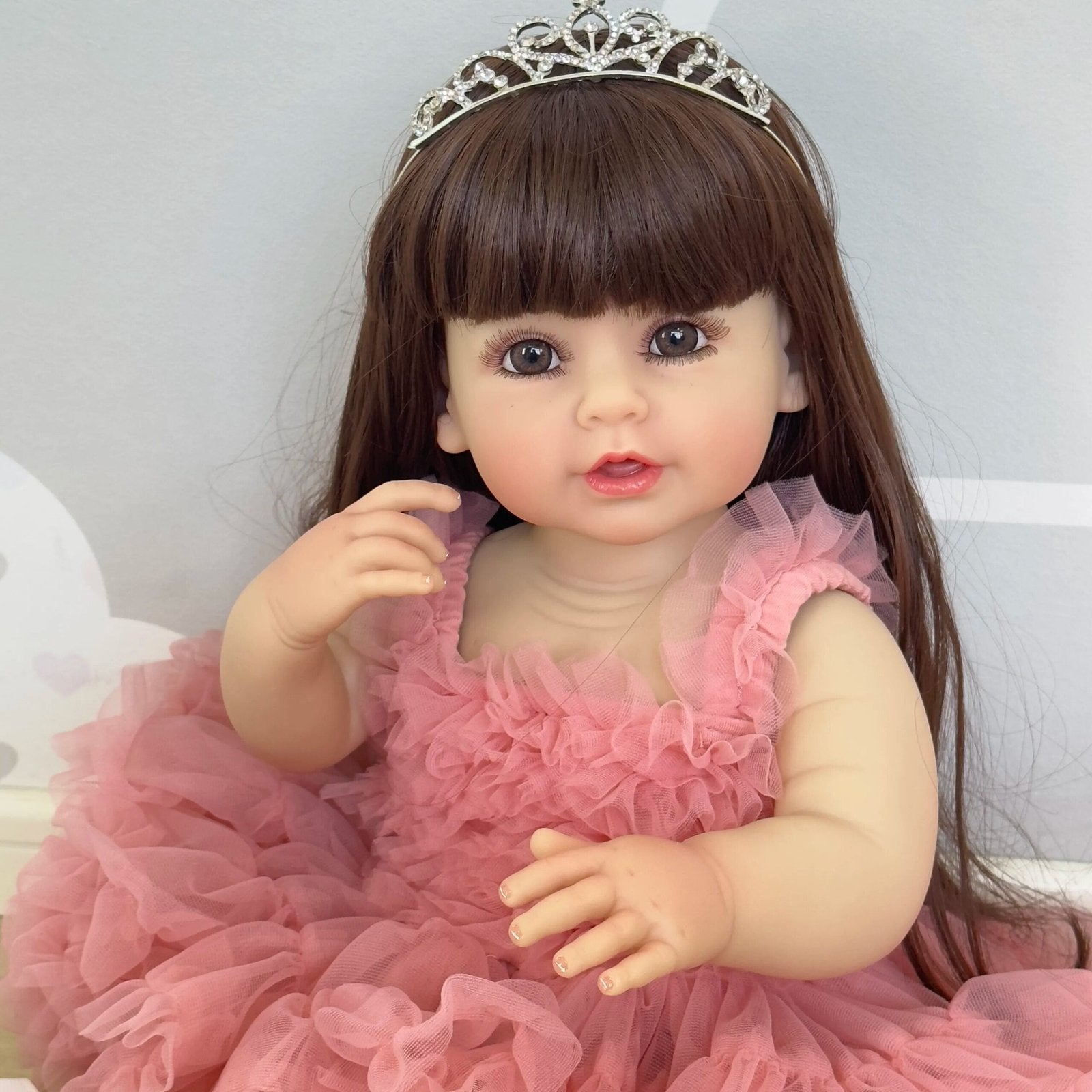 Princess Reborn Toddler Doll with soft full body silicone and pink dress detail for cuddling, collecting, and keepsake gifting.