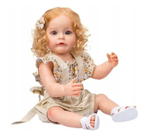 55cm Reborn Infant Doll with curly hair and floral dress in full silicone for nursery display, cuddling, and doll collecting.