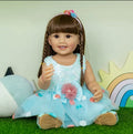 55CM Reborn Toddler Fashion Doll in a light blue floral skirt, a soft silicone lifelike doll for outdoor photo play and collecting.