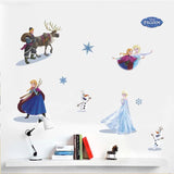 Wall stickers of Frozen characters on a white wall with 'Frozen' logo.