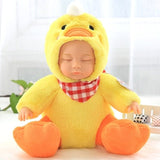 Baby doll in a yellow duck costume with a checkered bib on a light background