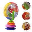 Colorful toy with a wheel and suction cup on a white background