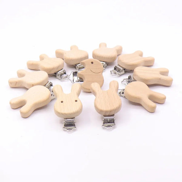 5PC Wooden Animal Pacifier Clips and Teethers Set laid out in full, beech dummy holders for soothing teething babies on the go.