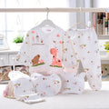 5PCS baby girl newborn clothing gift set with cartoon prints laid flat, a spring summer bodysuit bundle for daily dressing.