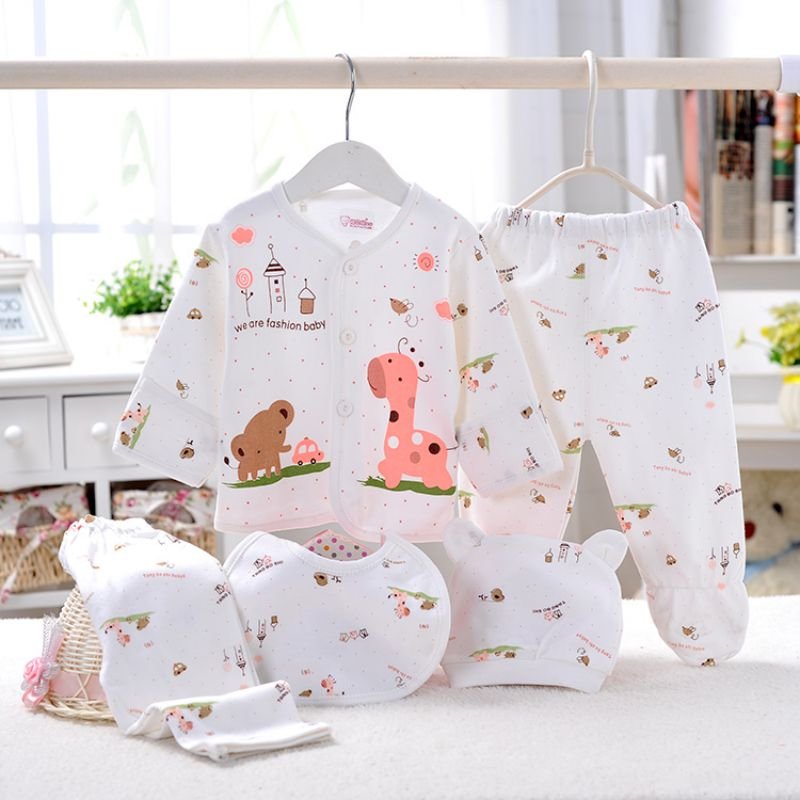 5PCS baby girl newborn clothing gift set with cartoon prints laid flat, a spring summer bodysuit bundle for daily dressing.