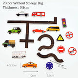 Toy road set with cars, traffic lights, and signs on a white background